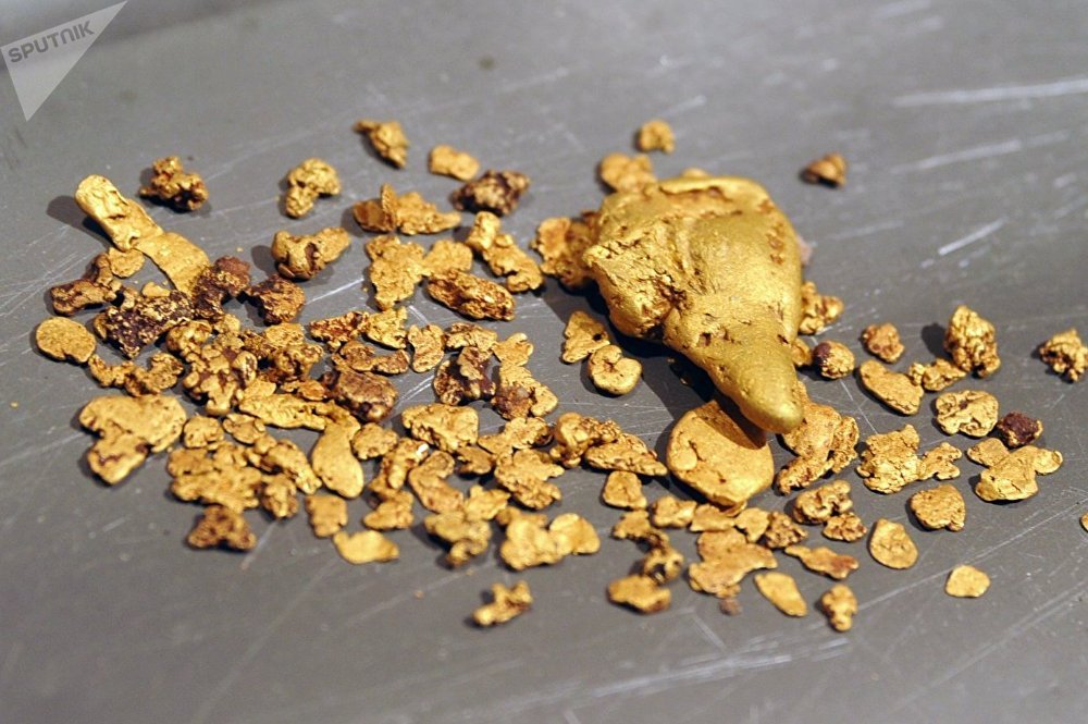 Oro baja por noticias comerciales positivas que mejoran apetito por riesgo