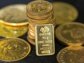 Oro cae por avance del dólar ante menor preocupación por guerra comercial