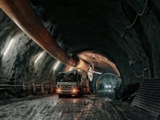 red and black truck in tunnel