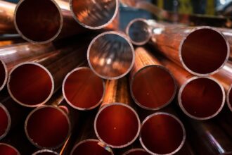 Alza récord en precio del cobre por inminente aplicación de aranceles