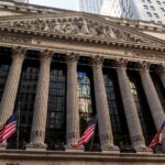 New york stock exchange building with american flags